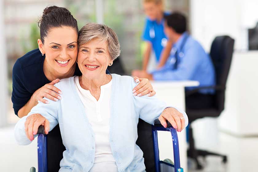 Adult daughter accompanying senior mother
