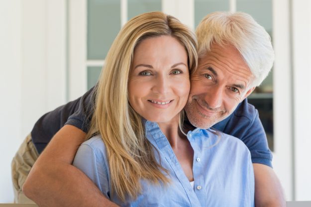 Man embracing woman Retiring Together With Your Spouse In Glen Mills, PA
