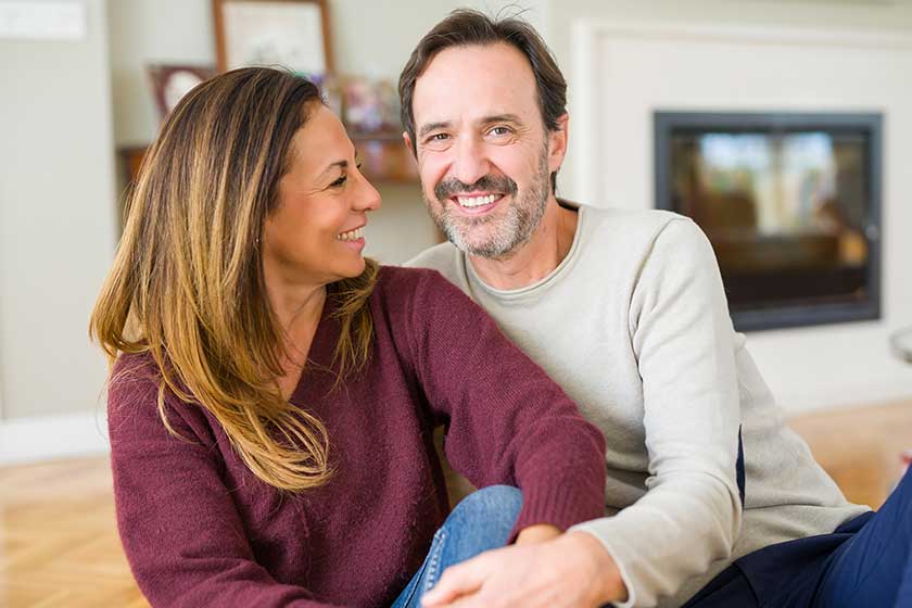 Beautiful romantic couple sitting together Beautiful romantic couple sitting together
