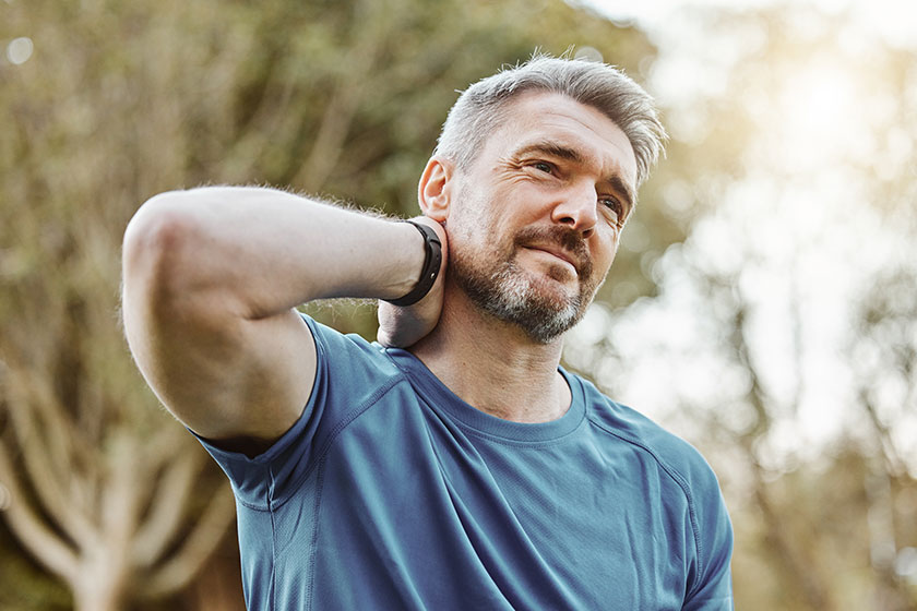 Runner man, neck pain and injury in park Runner man, neck pain and injury in park