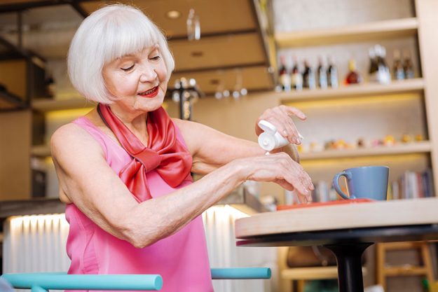 Nice good looking woman caring about her hands