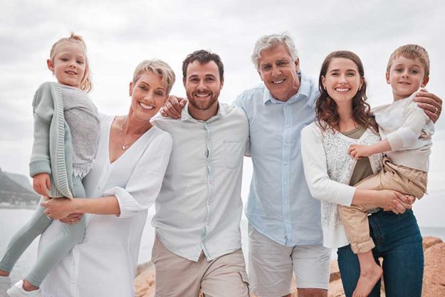 A-happy-family-enjoying-a-day-along-the-coast A-happy-family-enjoying-a-day-along-the-coast