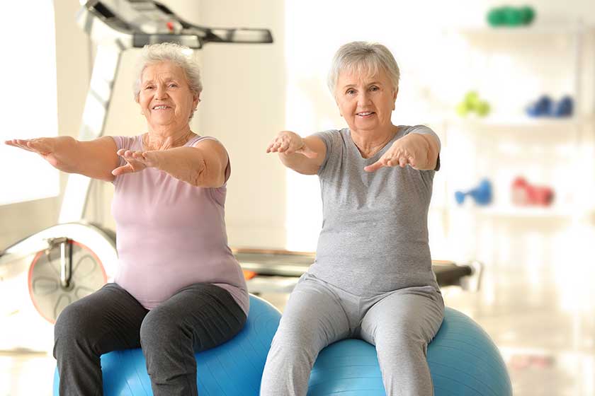 Elderly-women-exercising-in-gym Elderly-women-exercising-in-gym