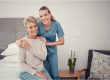 Homecare-senior-healthcare-doctor-helping-sick-woman-care-bedroom-home