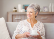 Woman holding coffee cup