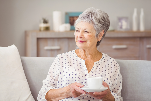 woman-holding-coffee-cup Woman holding coffee cup